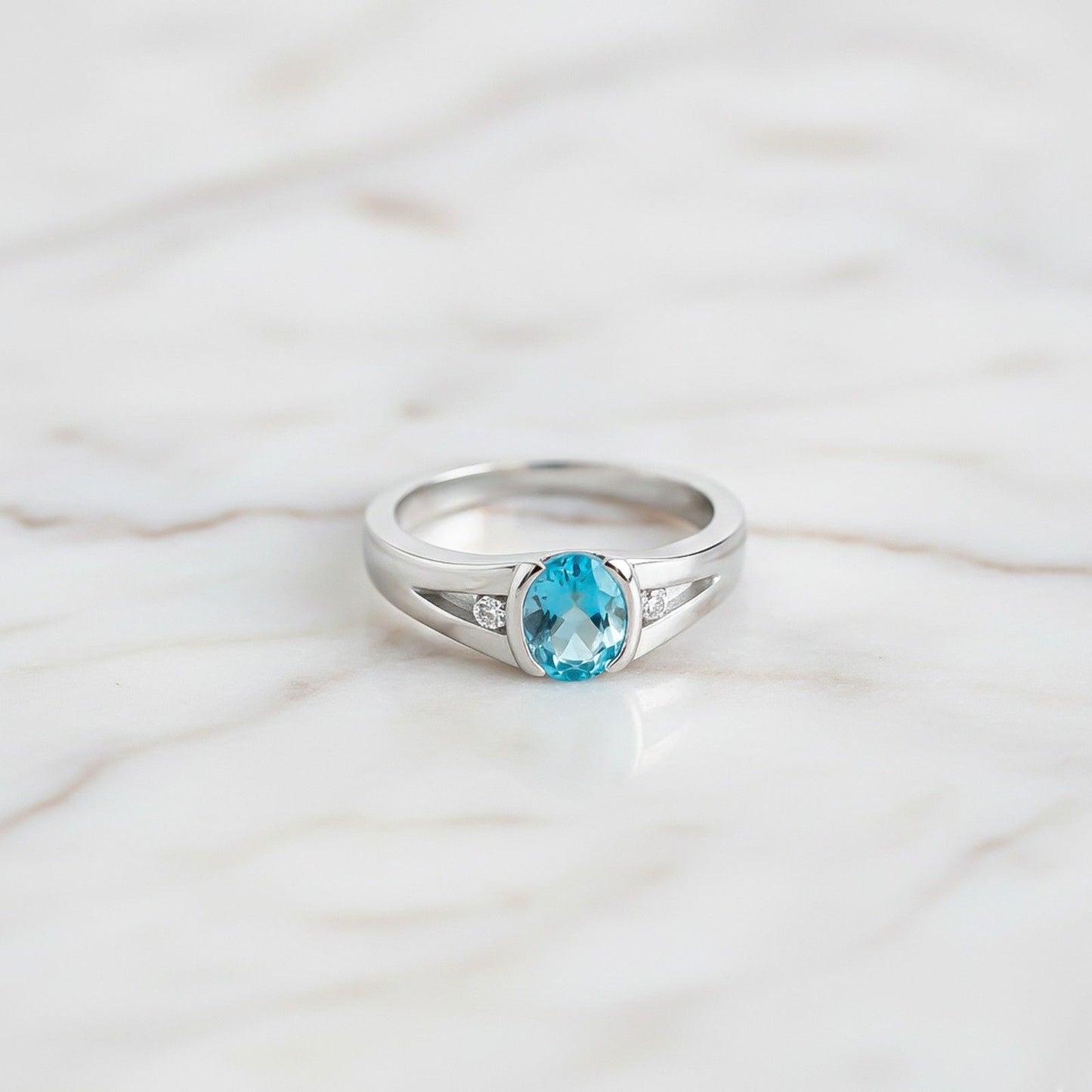 Silver Solitaire Topaz Ring