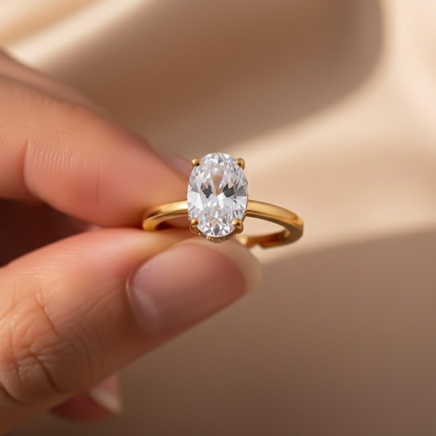 Golden Oval Solitaire Engagement Ring