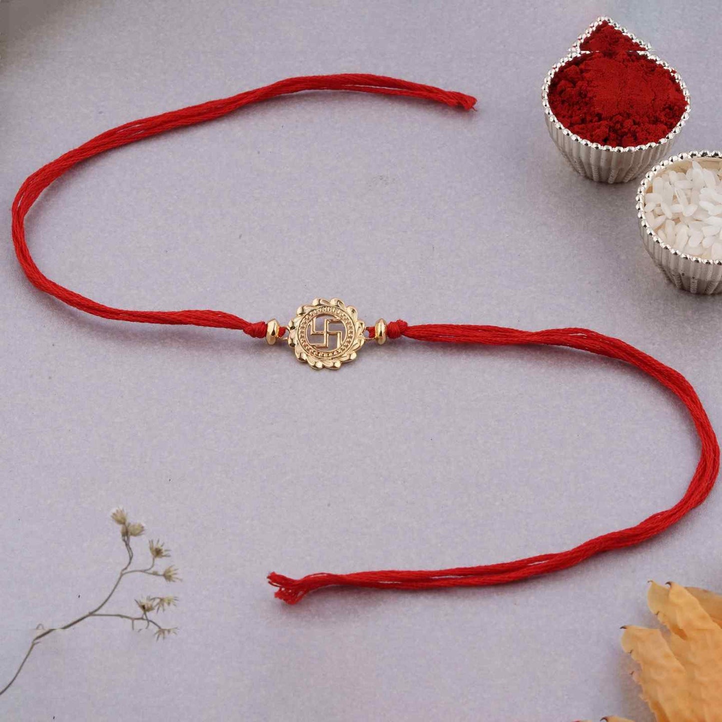 Silver Rakhi: Golden Classic Swastik Rakhi For Brother