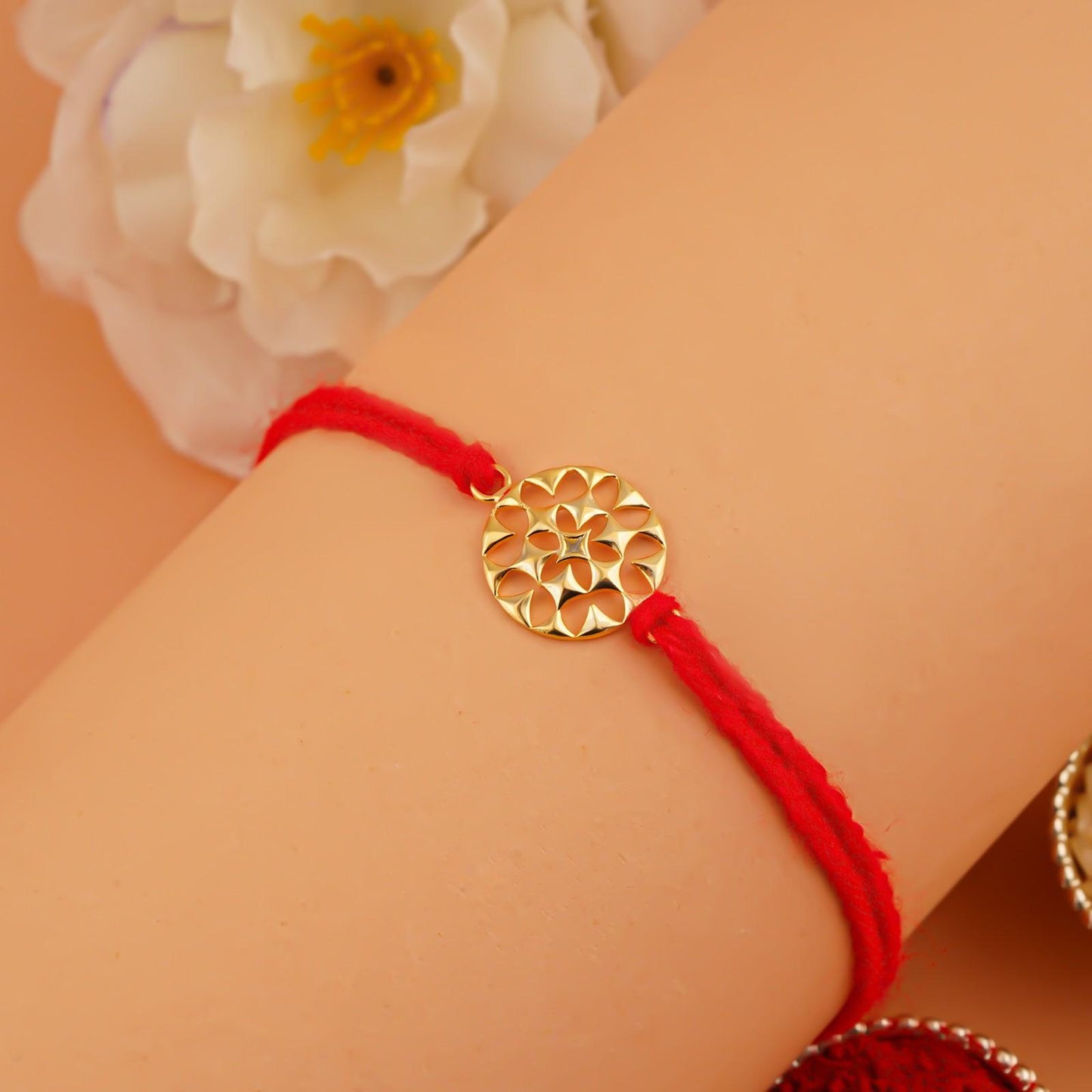 Silver Rakhi: Golden Sayukta Mesh Rakhi