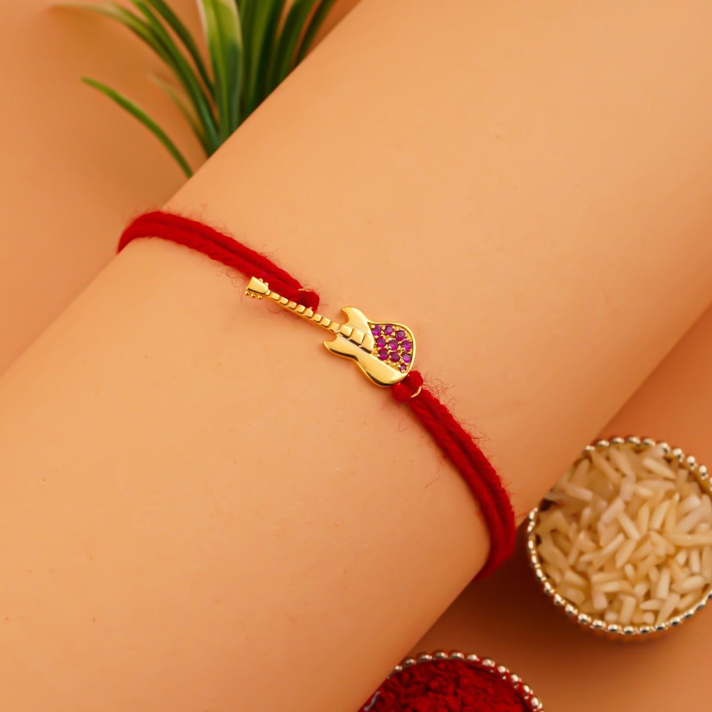 Silver Rakhi: Golden Guitar Ruby Rakhi For Kids