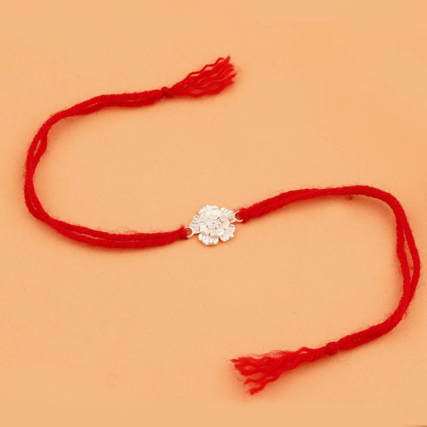 Silver Rakhi: Silver Floral Rakhi For Brother