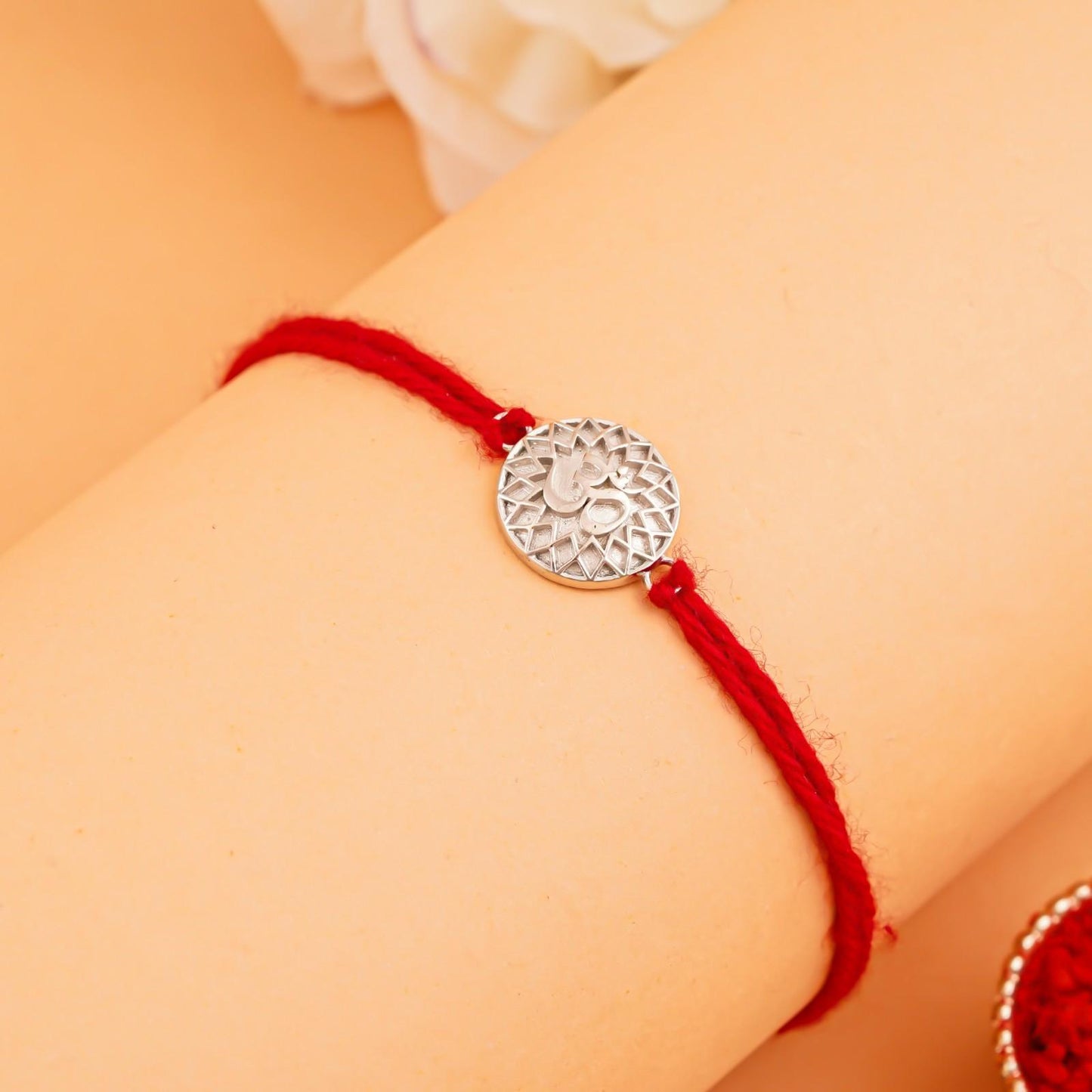 Silver Rakhi: Silver Sprial OM Rakhi