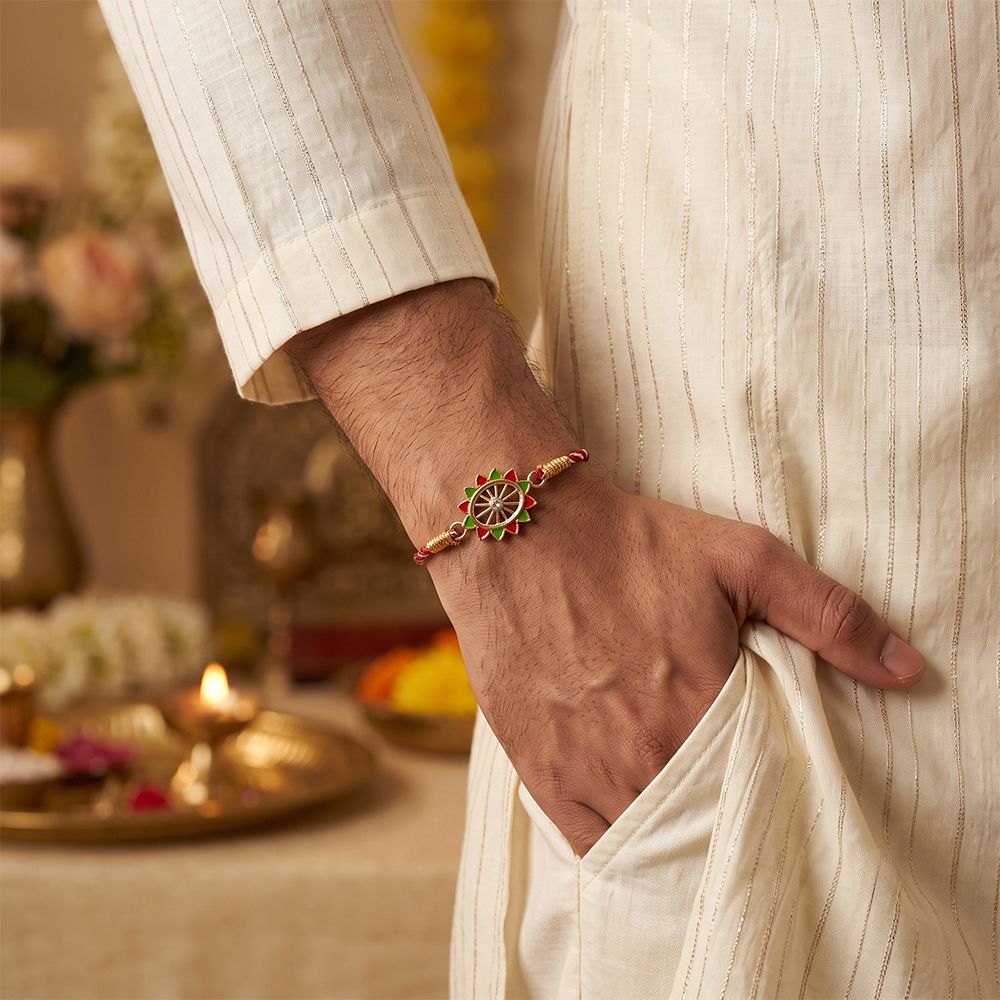 Golden Pinwheel Enamel Rakhi