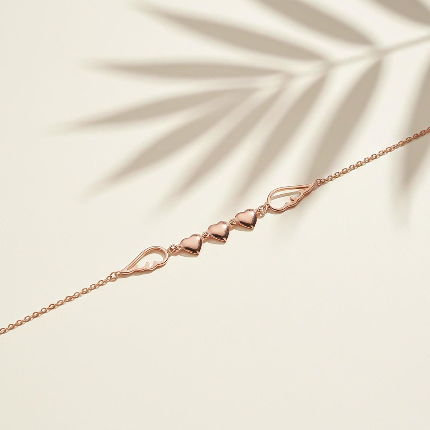 Rose Gold Triplet Heart & Wings Anklet