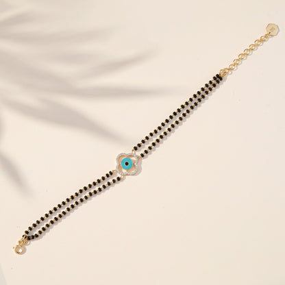 Golden Evil Eye Clover Bead Bracelet