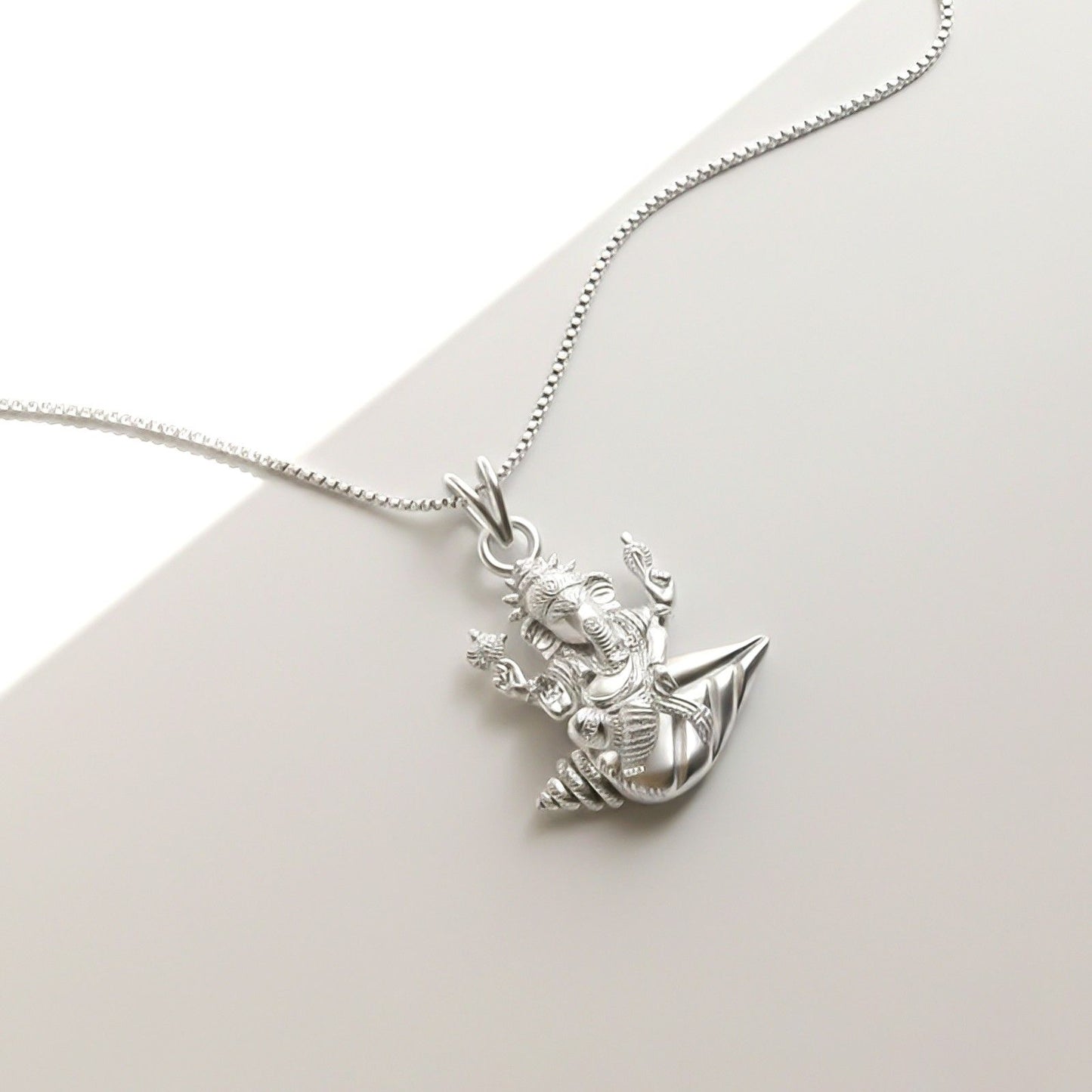 Silver Deva Shree Ganesha Sitting On Shankh Pendant