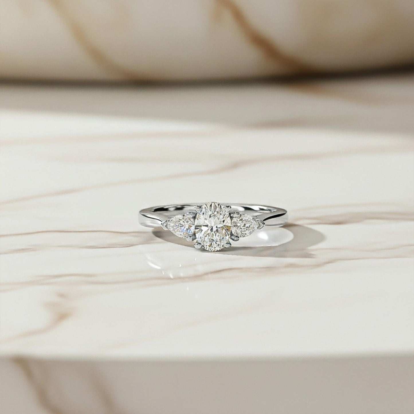 Silver Oval and Pear Moissanite Trilogy Ring