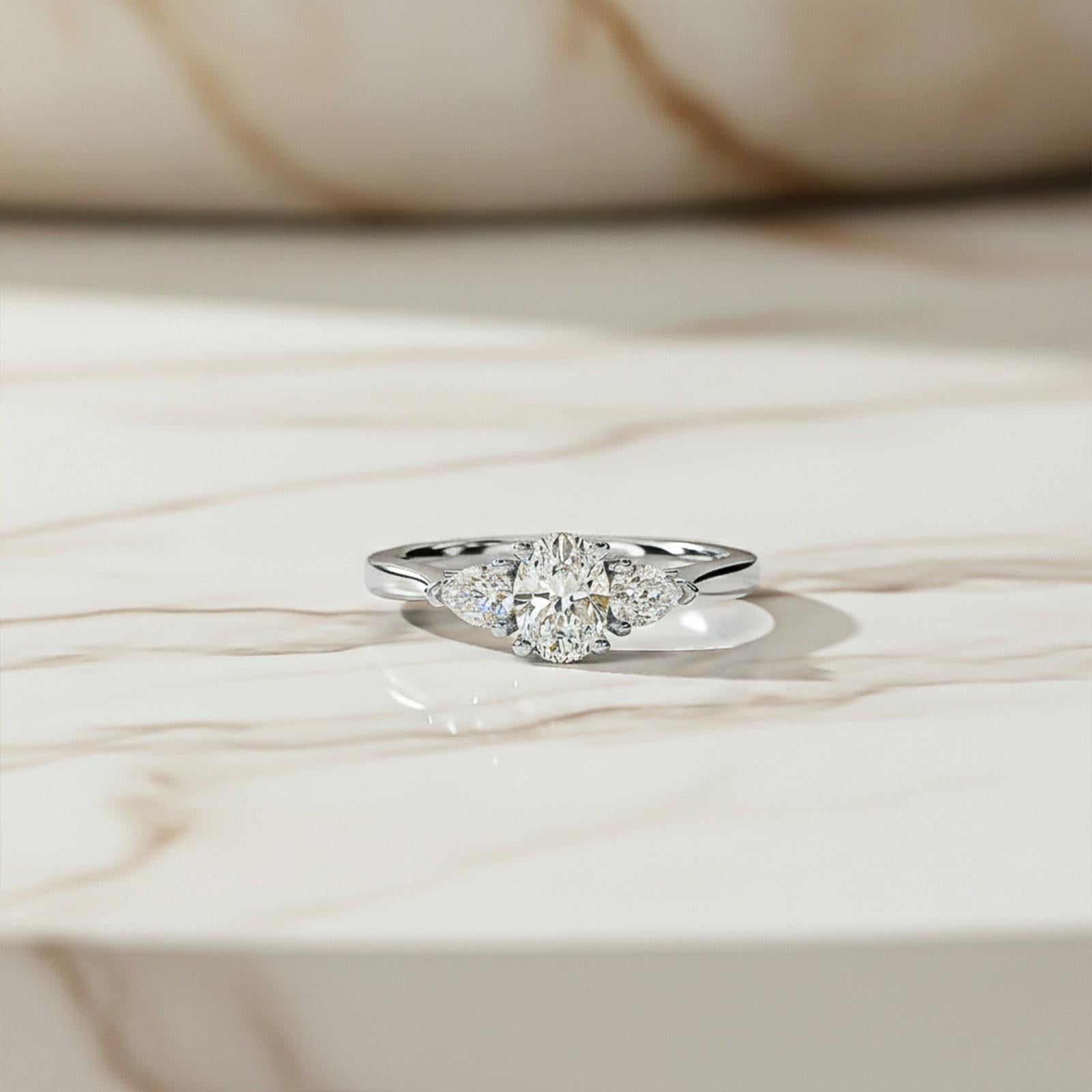 Silver Oval and Pear Moissanite Trilogy Ring
