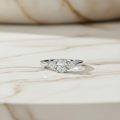 Silver Oval and Pear Moissanite Trilogy Ring