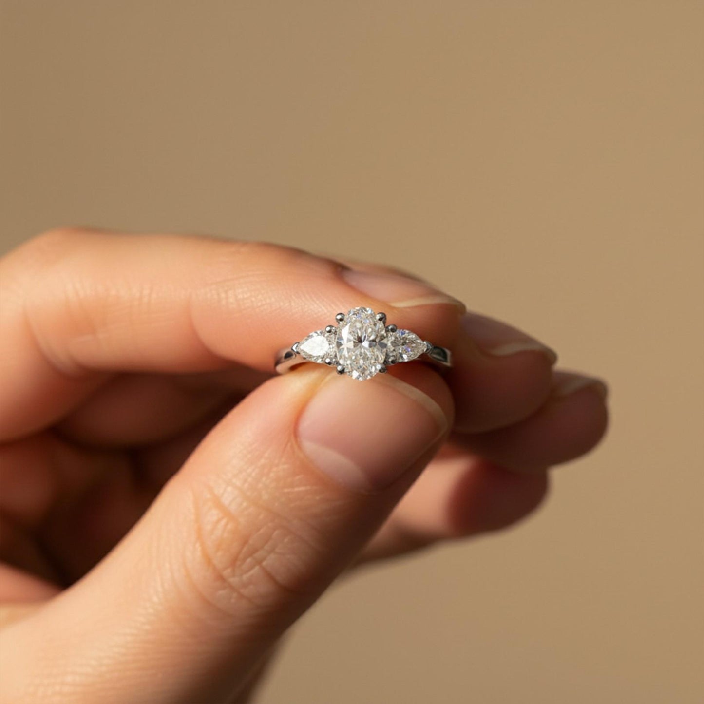 Silver Oval and Pear Moissanite Trilogy Ring