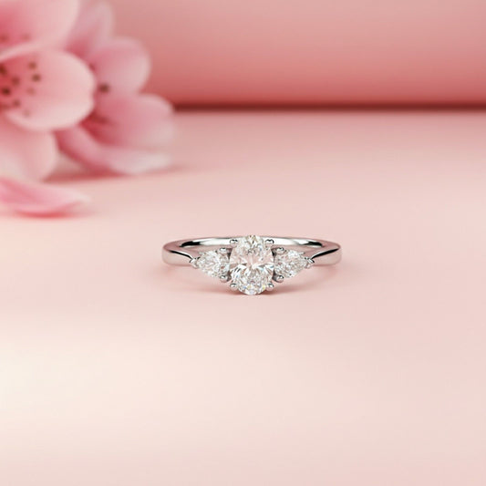 Silver Oval and Pear Moissanite Trilogy Ring