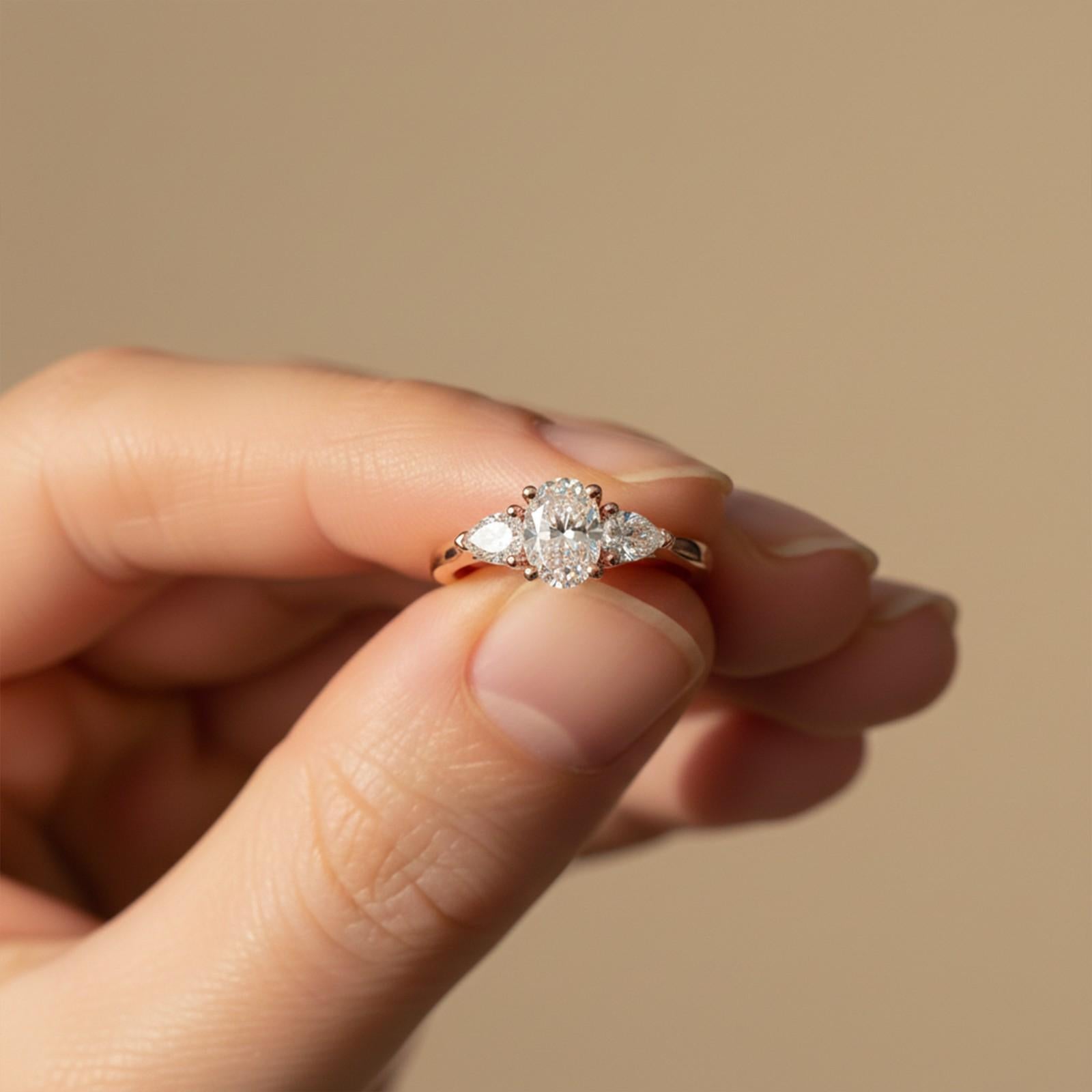 Silver Oval and Pear Moissanite Trilogy Ring