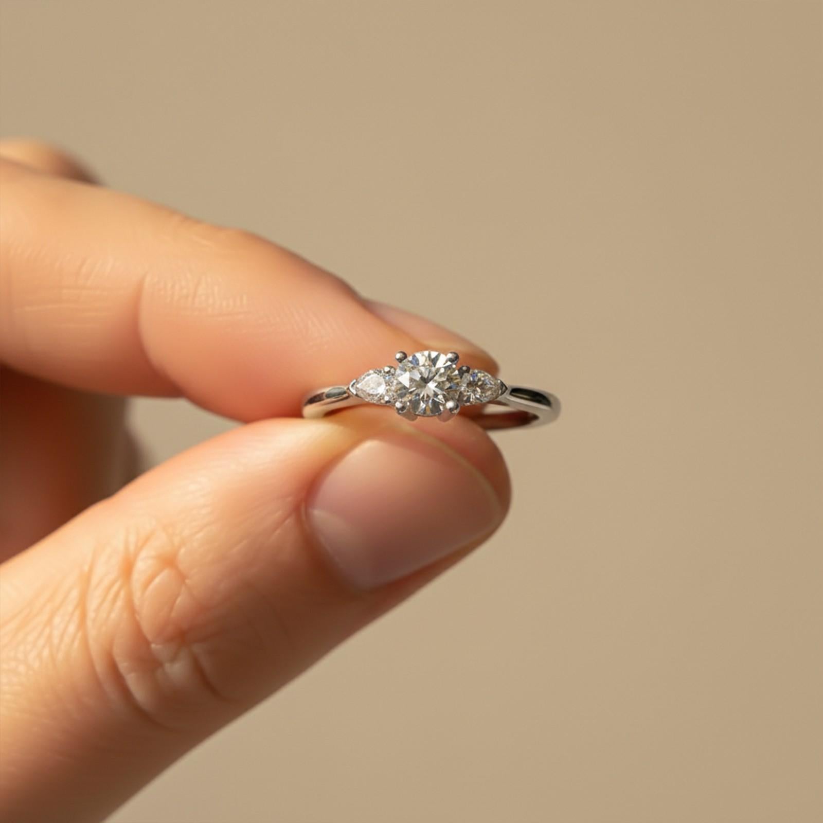 1Ct Moissanite Vega Round and Pear Trilogy Ring