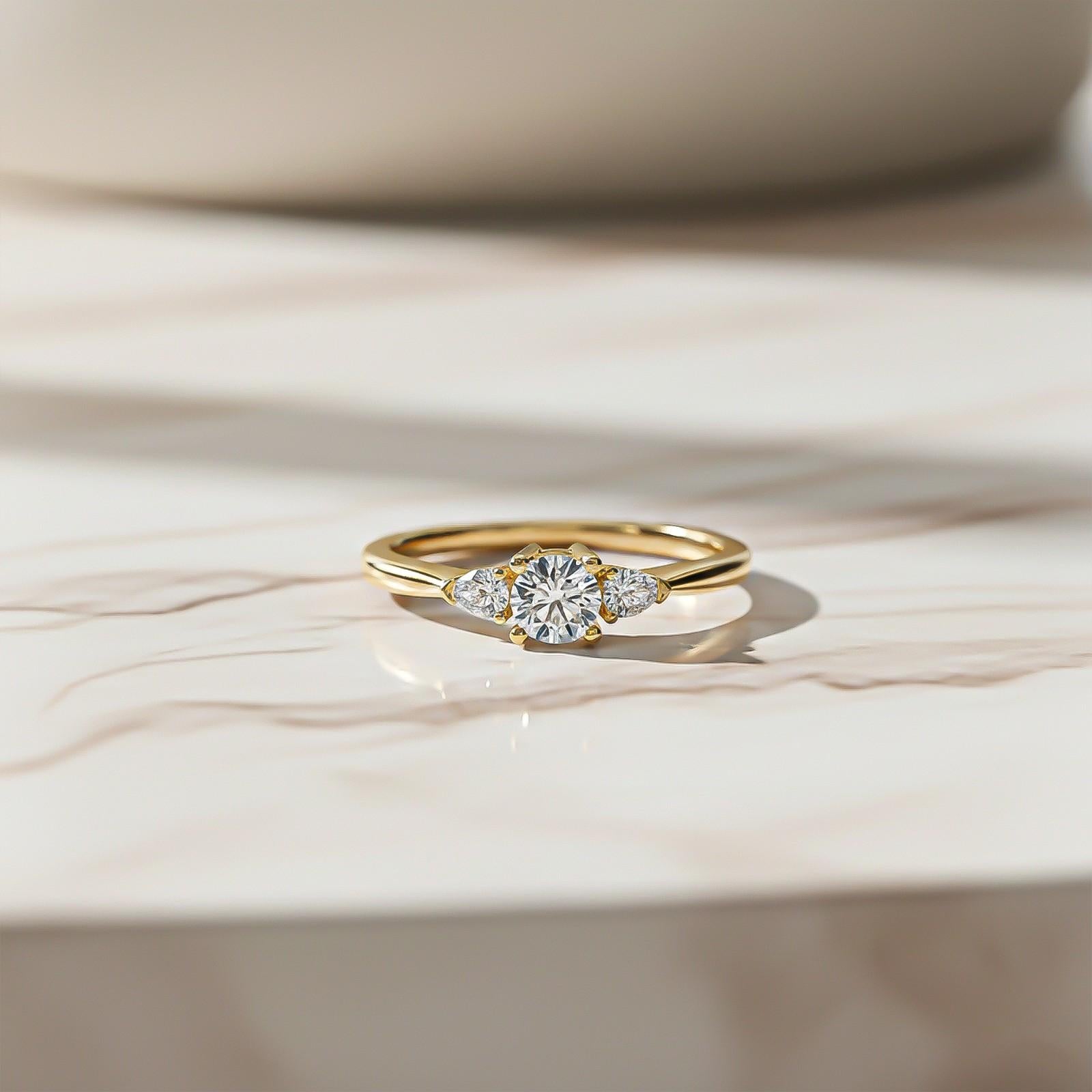 1Ct Moissanite Vega Round and Pear Trilogy Ring