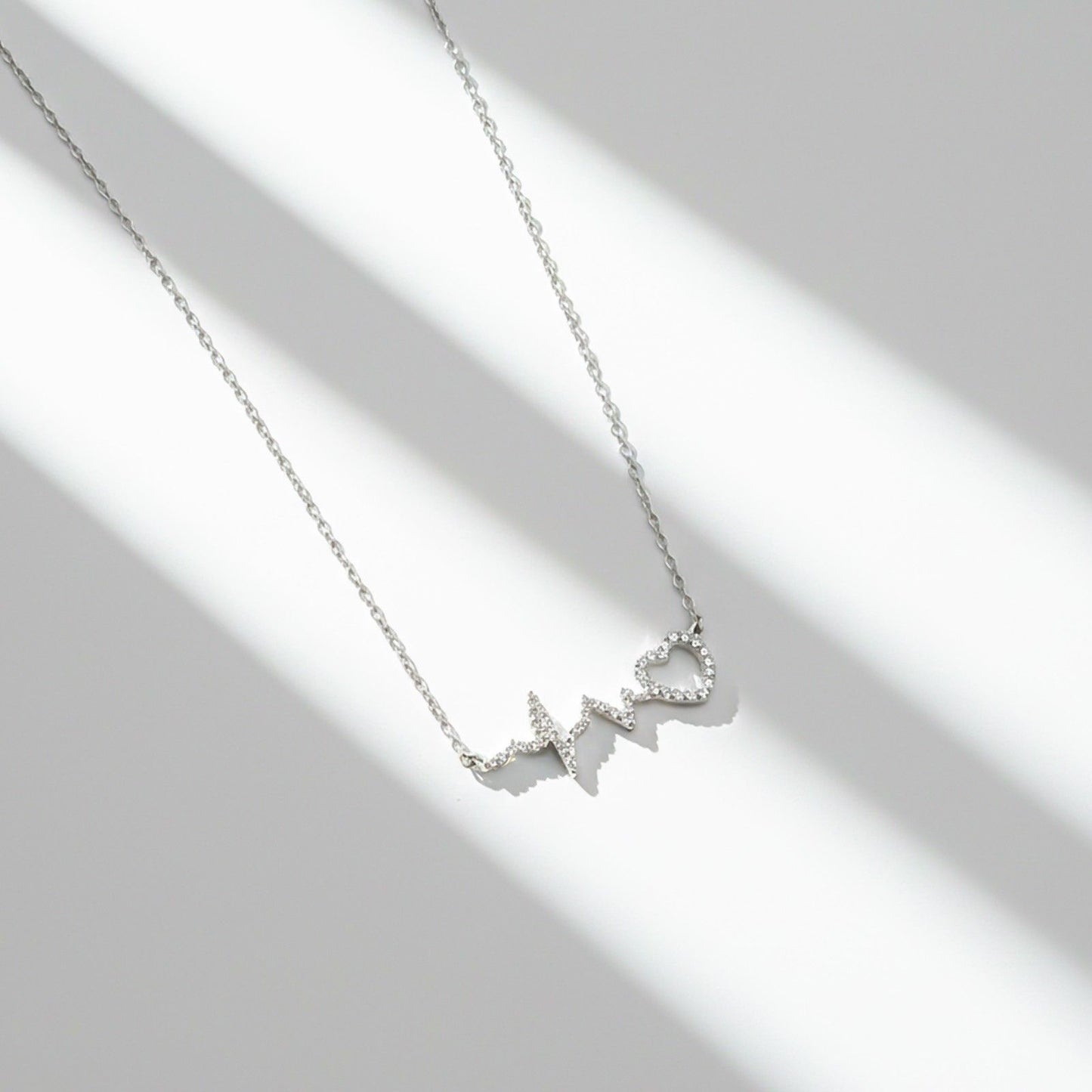 Silver Zircon Heartbeat Necklace