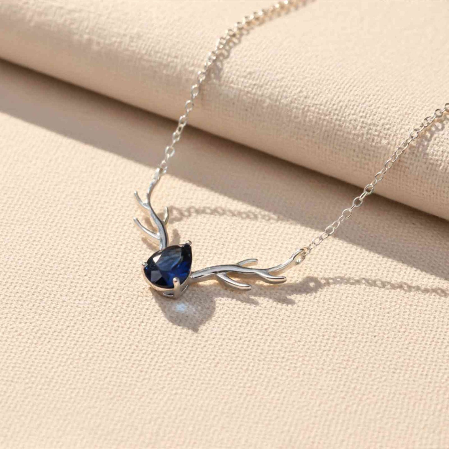 Silver Deer Antler Blue Sapphire Necklace