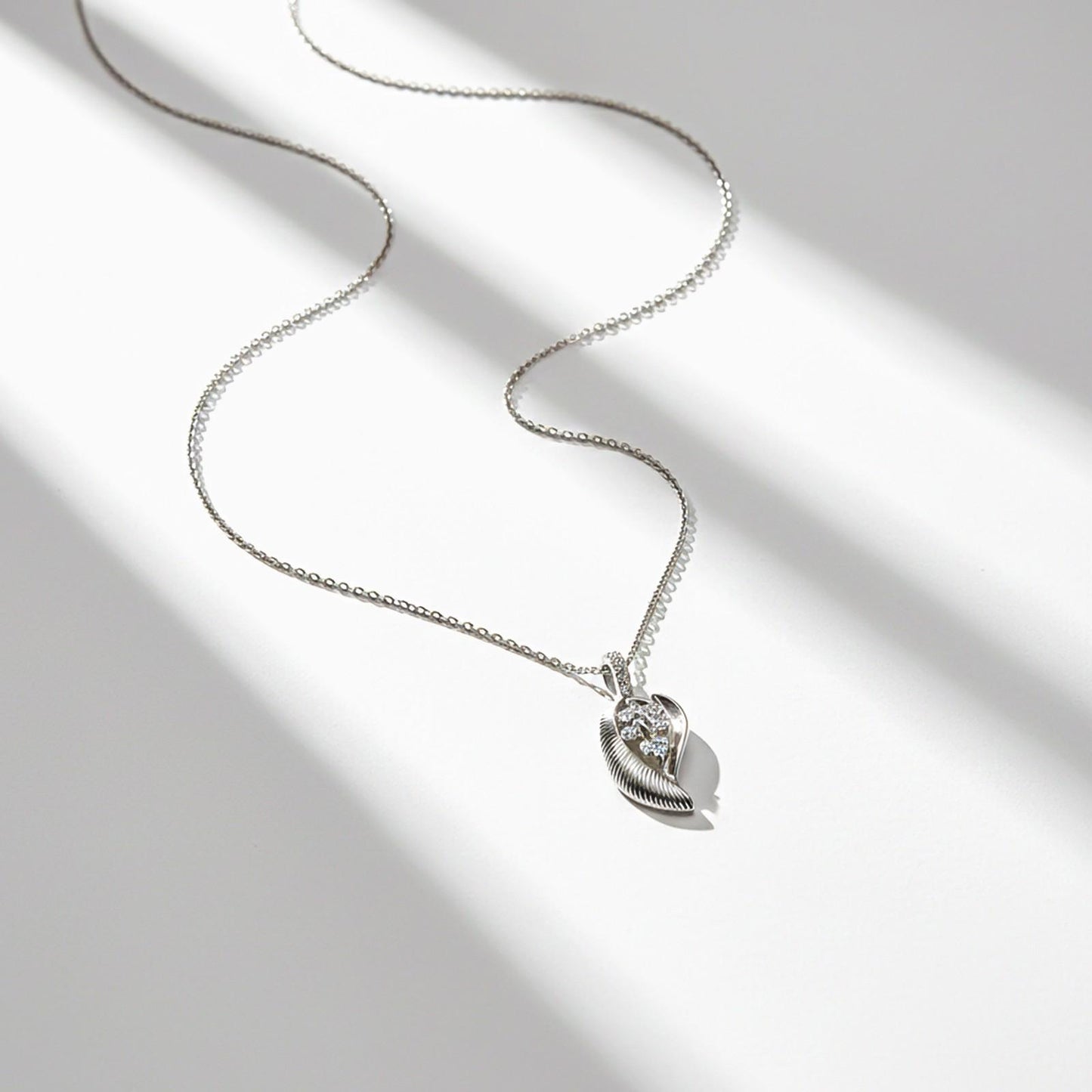 Swiss Stone Leaf Design Pendant