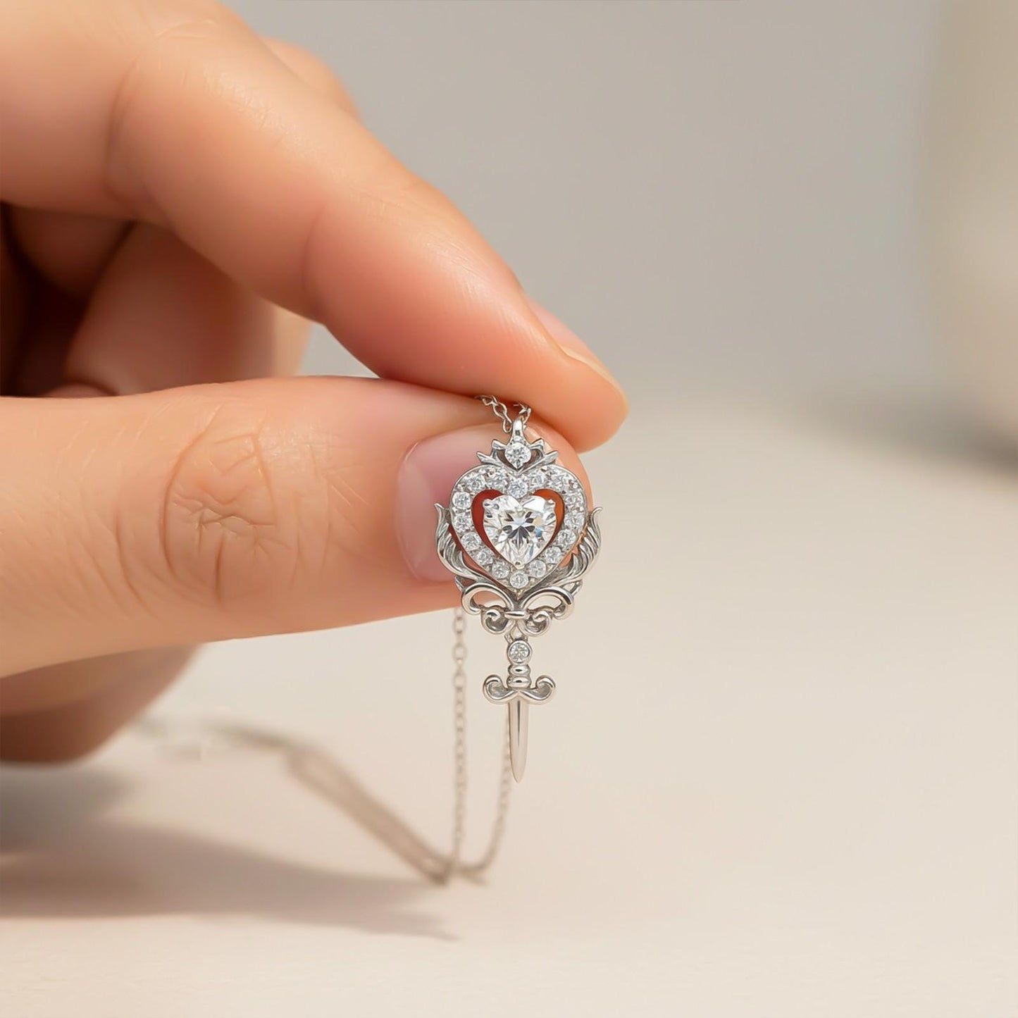 Silver Round Heart Weapon Pendant