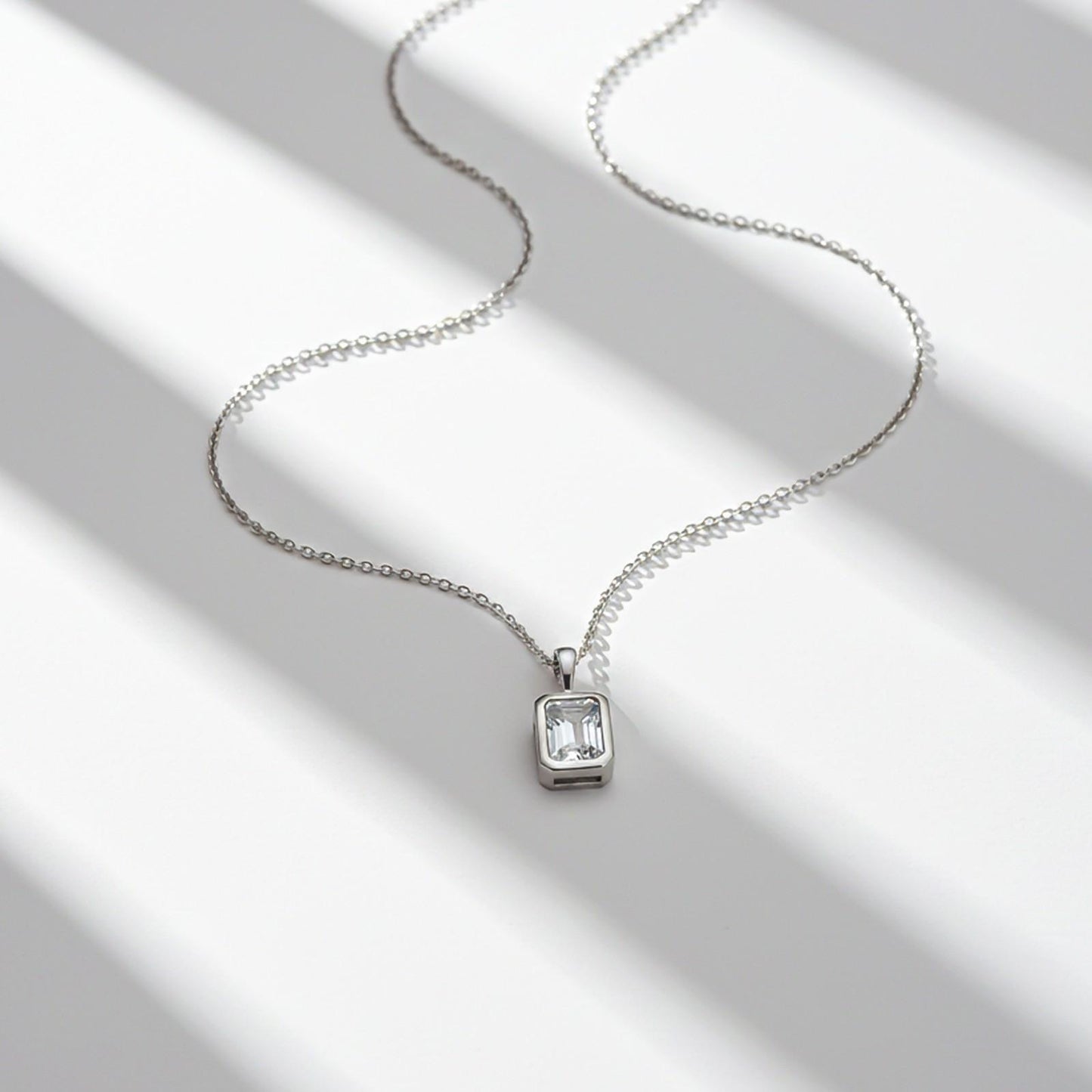 Silver Luxurious Emerald Solitaire Pendant