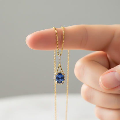 Golden Dazzling Halo Sapphire Pendant