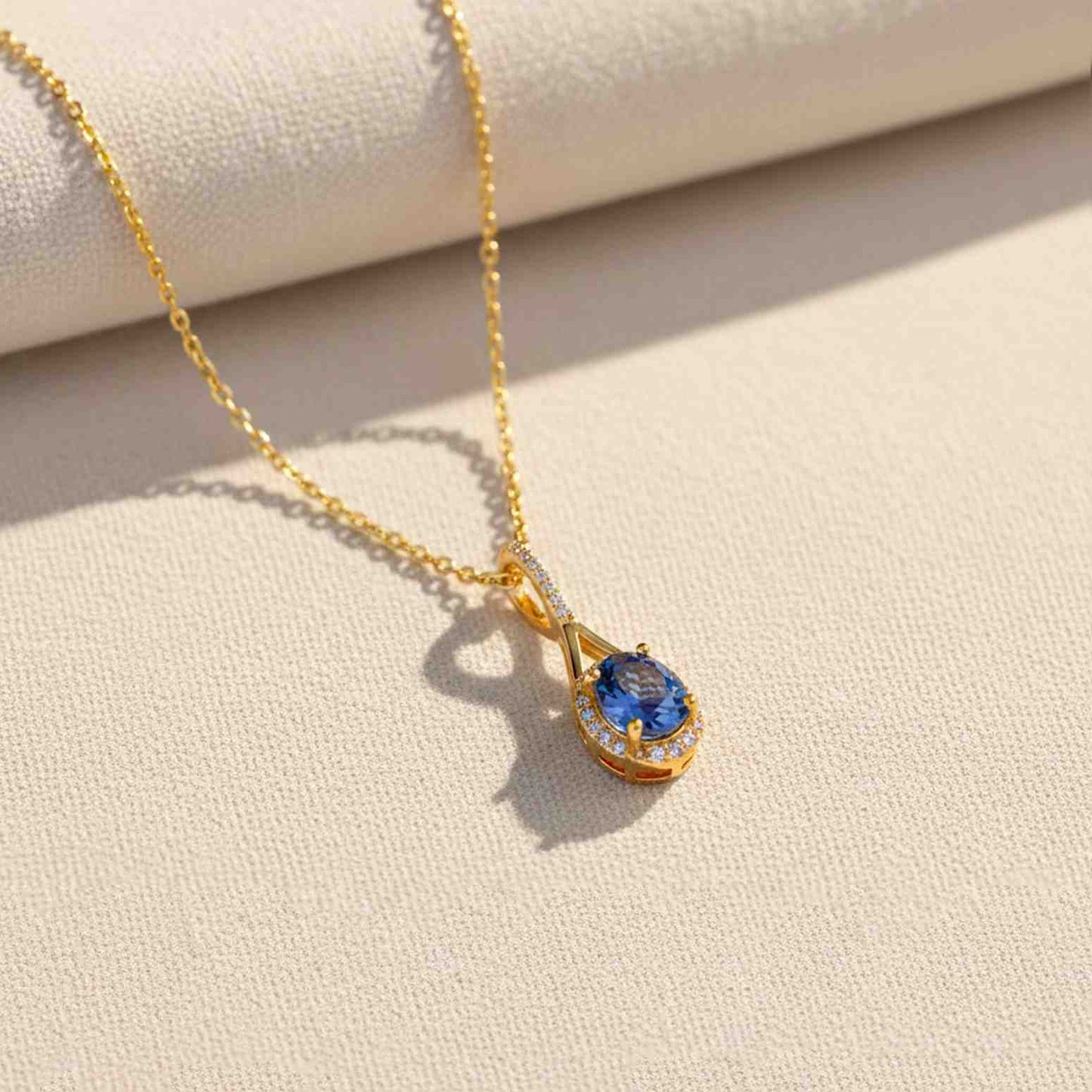 Golden Dazzling Halo Sapphire Pendant