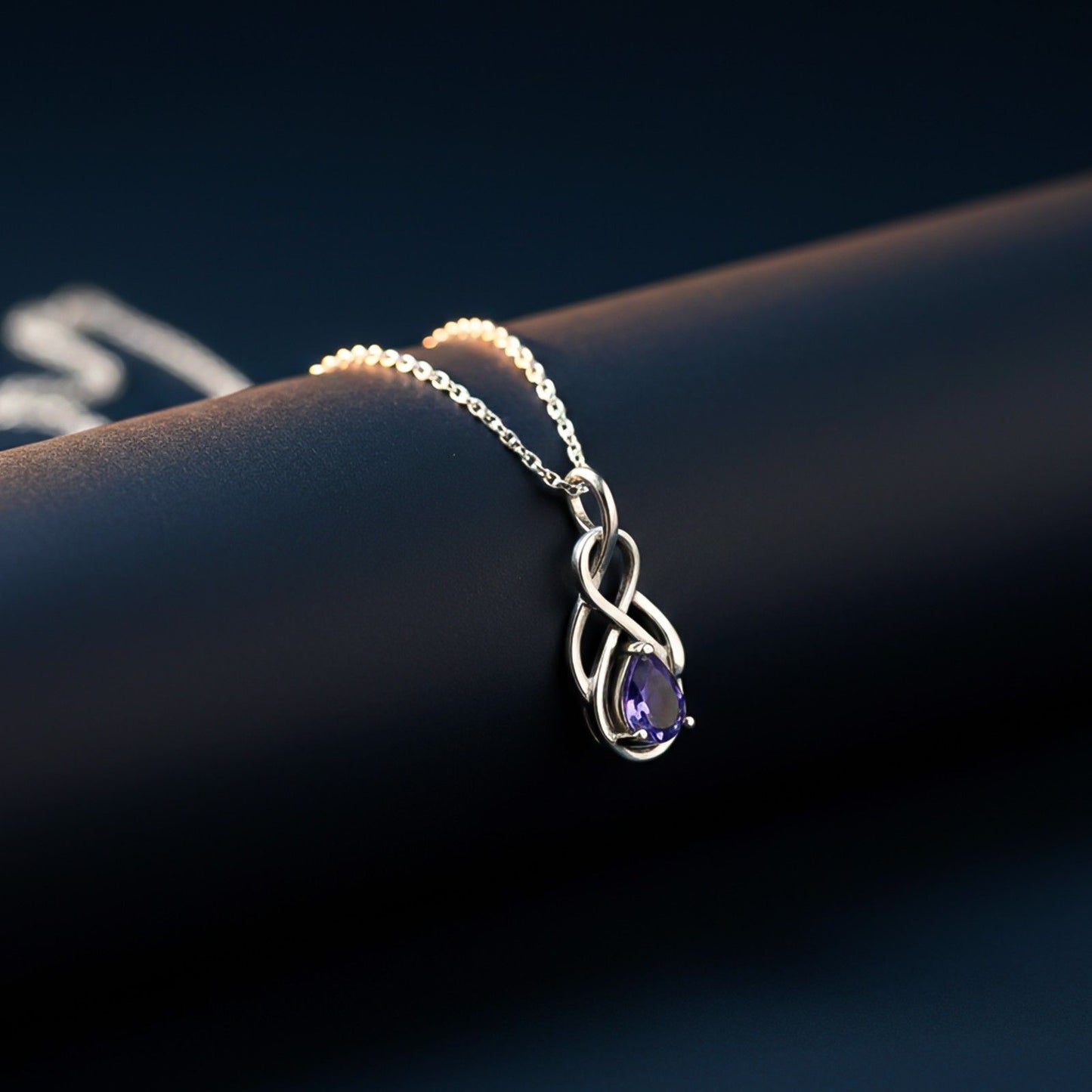 Silver Sapphire Infinity knot Pendant