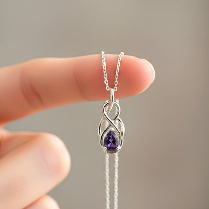 Silver Sapphire Infinity knot Pendant