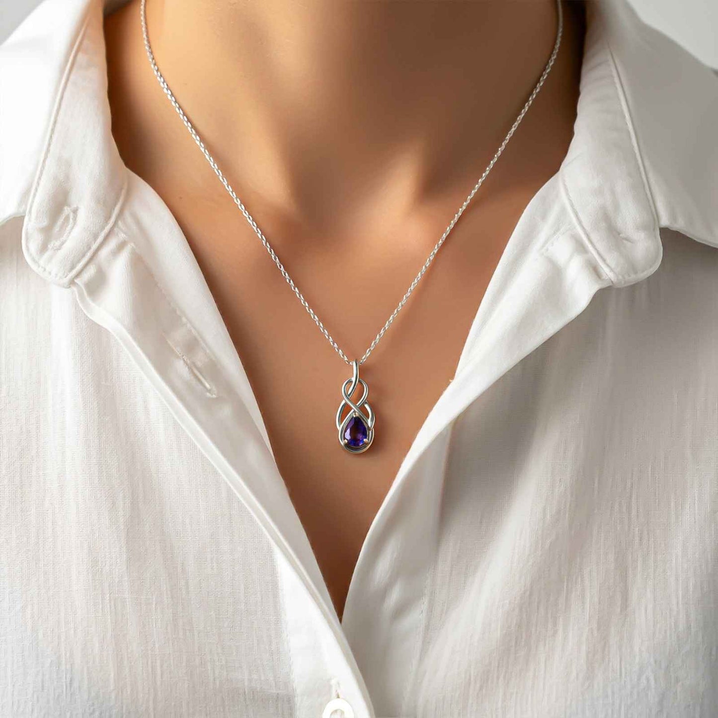 Silver Sapphire Infinity knot Pendant