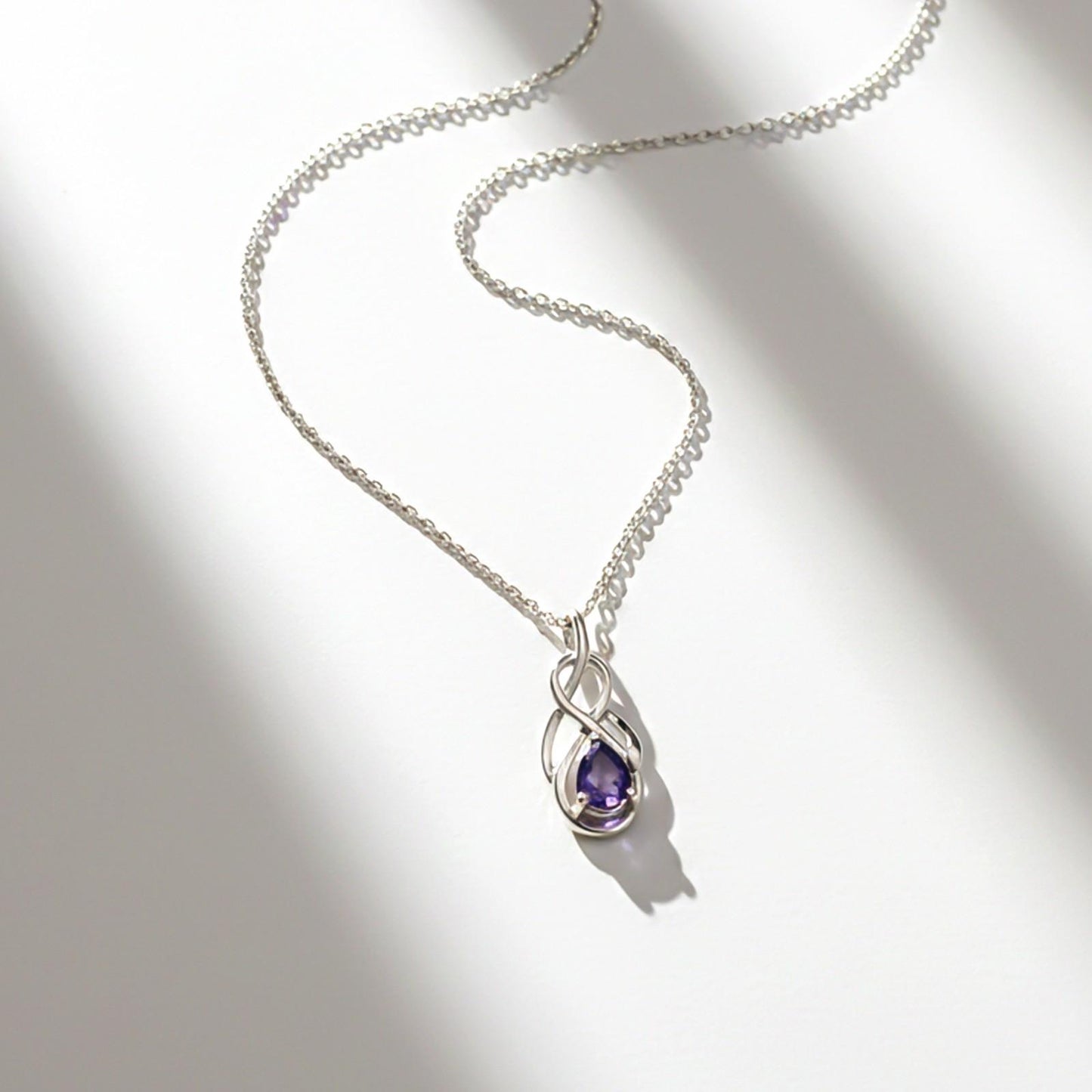 Silver Sapphire Infinity knot Pendant
