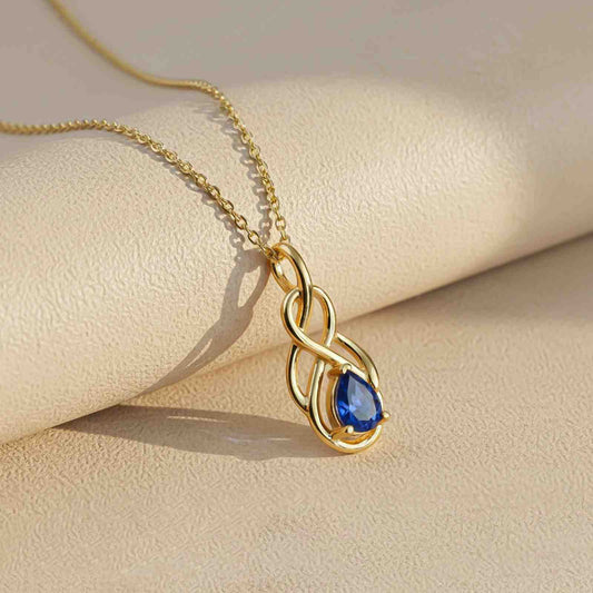 Golden Sapphire Infinity knot Pendant