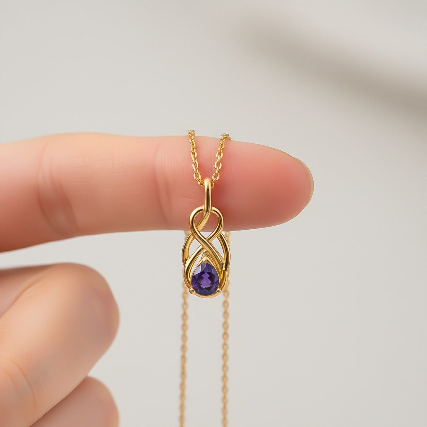 Golden Sapphire Infinity knot Pendant