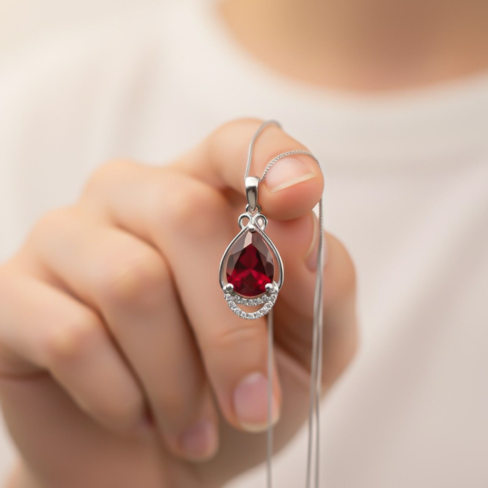 Silver Teardrop Ruby Pendant with CZ Curve