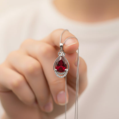 Silver Teardrop Ruby Pendant with CZ Curve