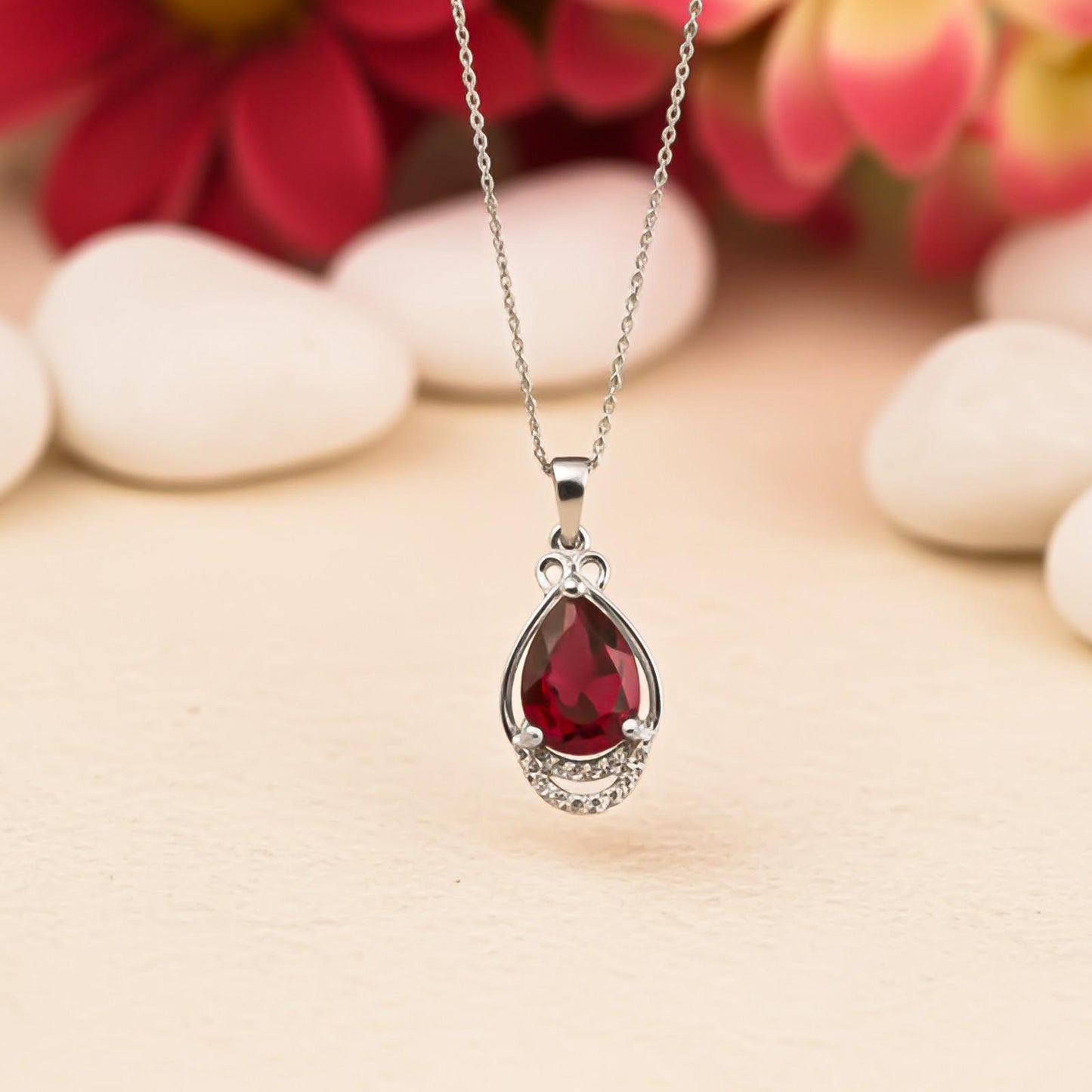 Silver Teardrop Ruby Pendant with CZ Curve