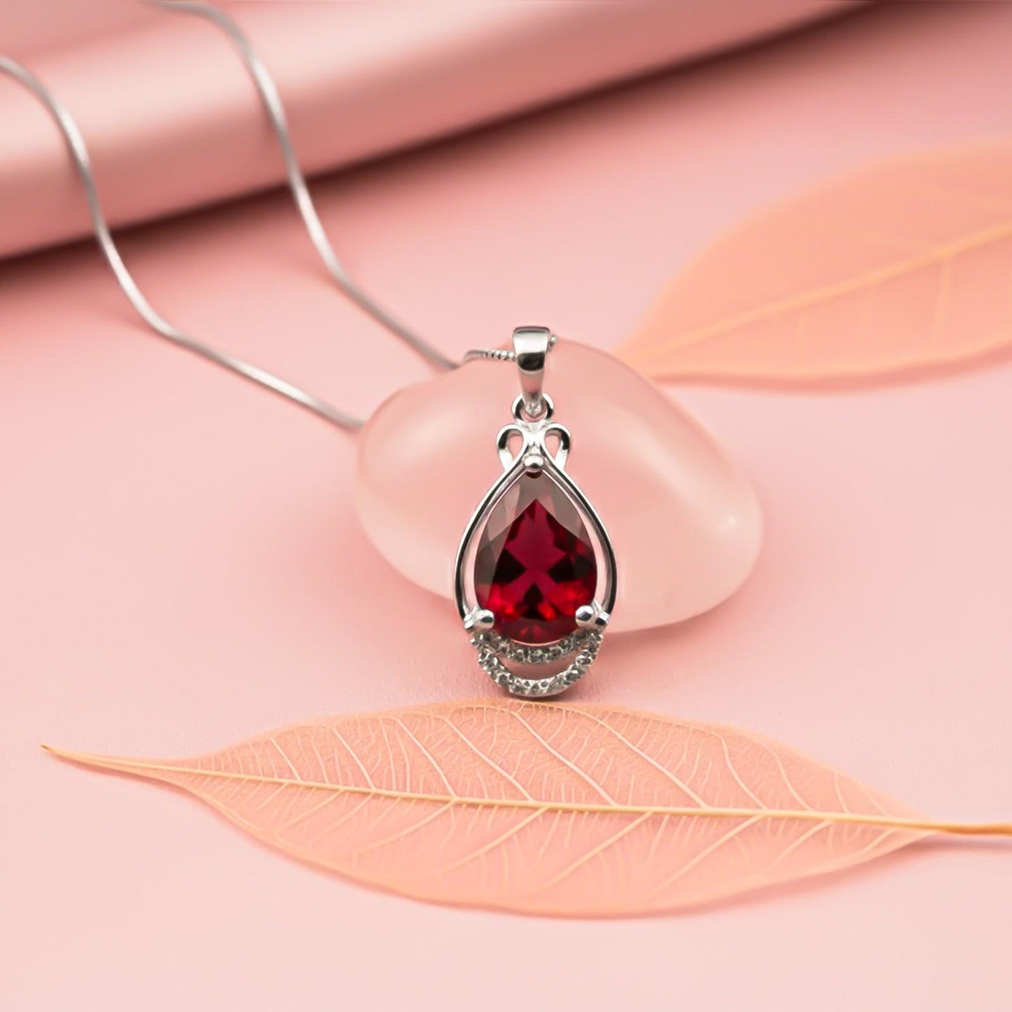 Silver Teardrop Ruby Pendant with CZ Curve