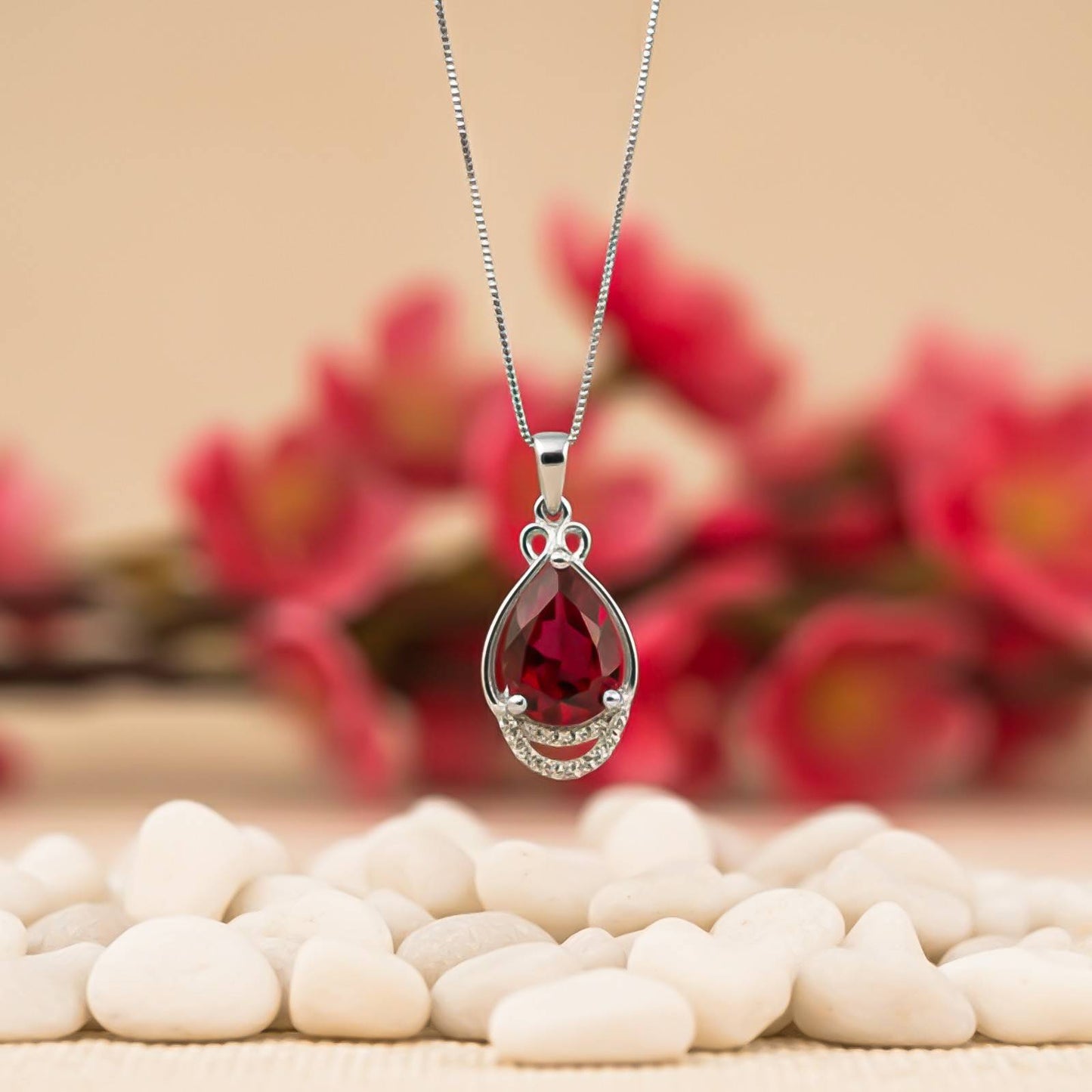 Silver Teardrop Ruby Pendant with CZ Curve