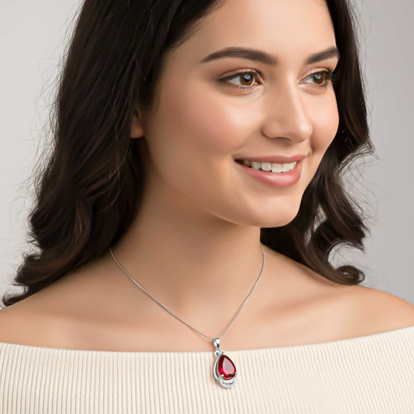 Silver Teardrop Ruby Pendant with CZ Curve
