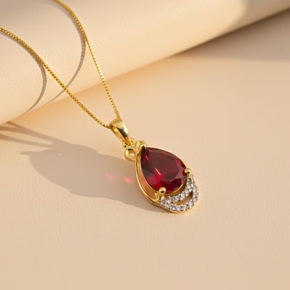 Silver Teardrop Ruby Pendant with CZ Curve