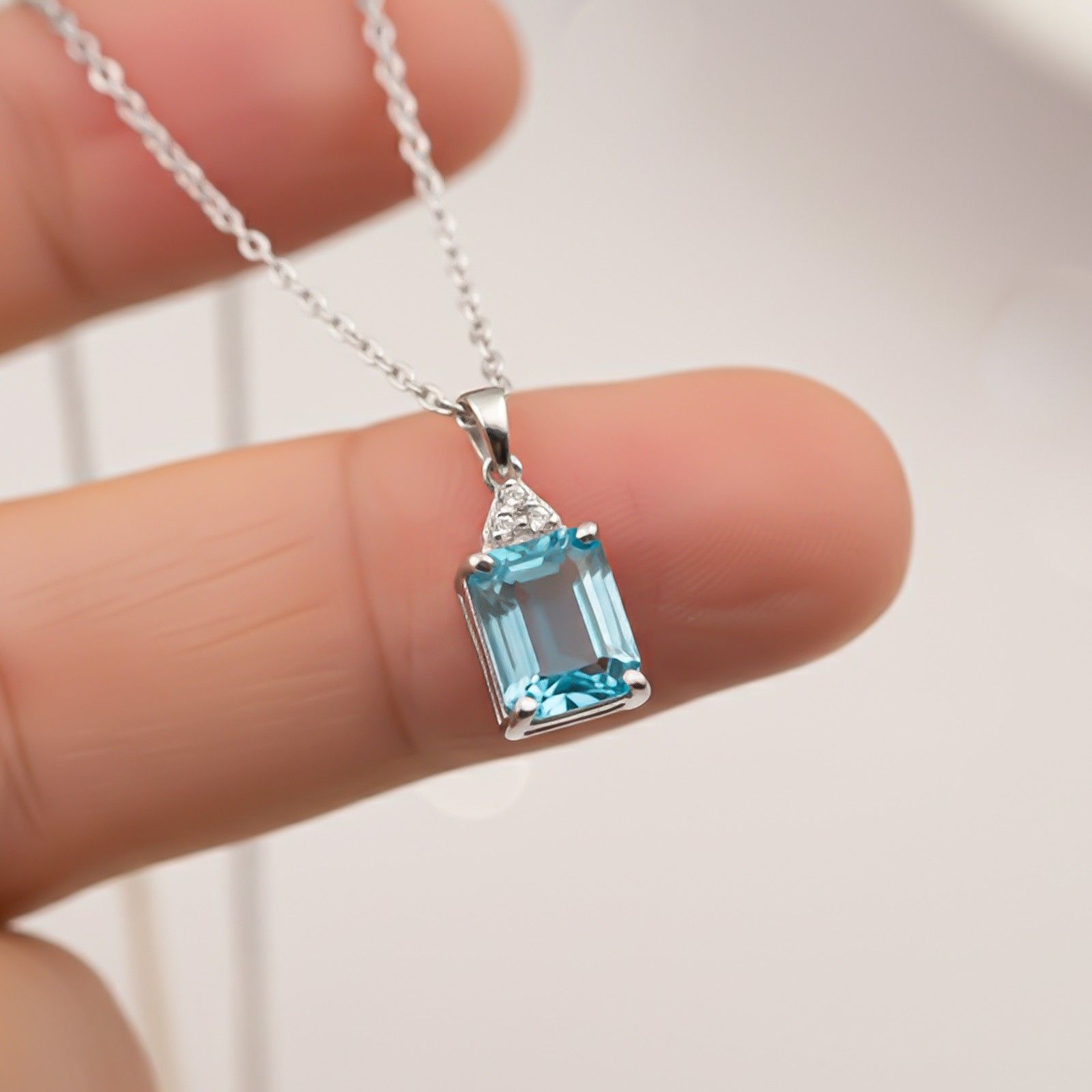 Silver Blue Topaz Emerald Cut Pendant