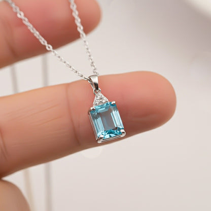 Silver Blue Topaz Emerald Cut Pendant