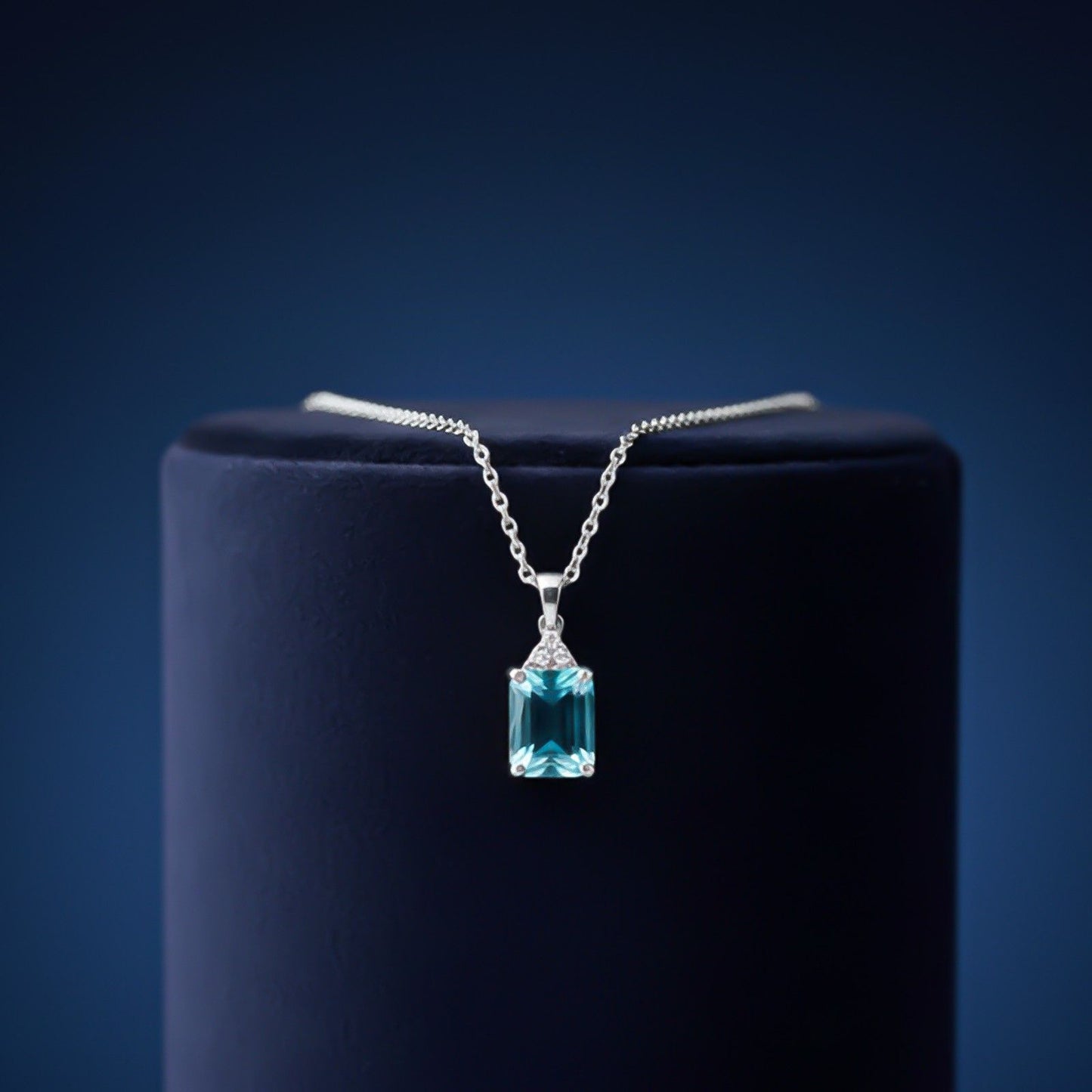Silver Blue Topaz Emerald Cut Pendant