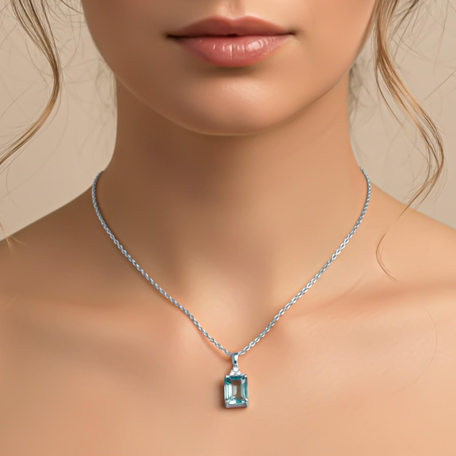 Silver Blue Topaz Emerald Cut Pendant