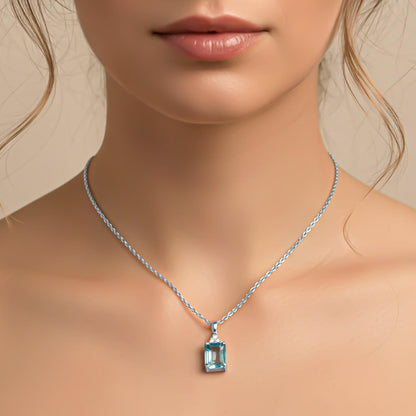 Silver Blue Topaz Emerald Cut Pendant