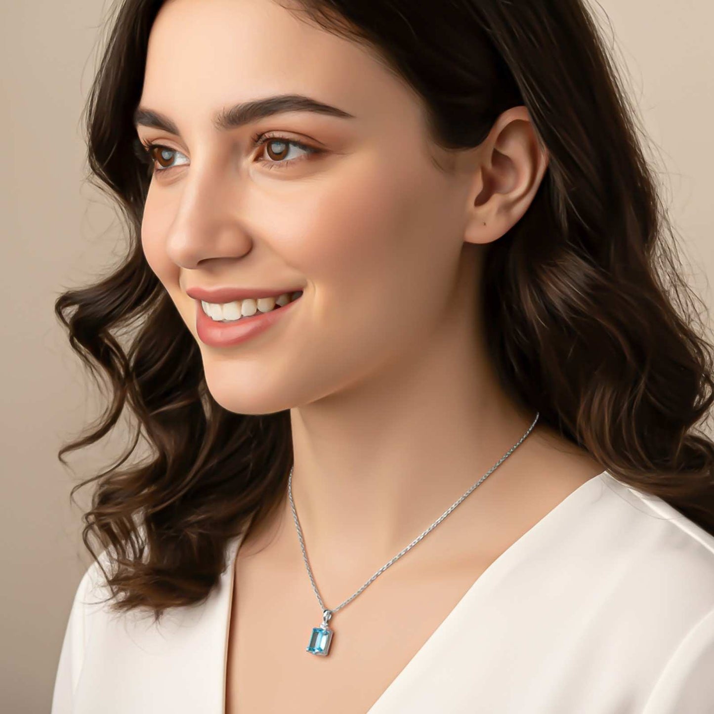 Silver Blue Topaz Emerald Cut Pendant