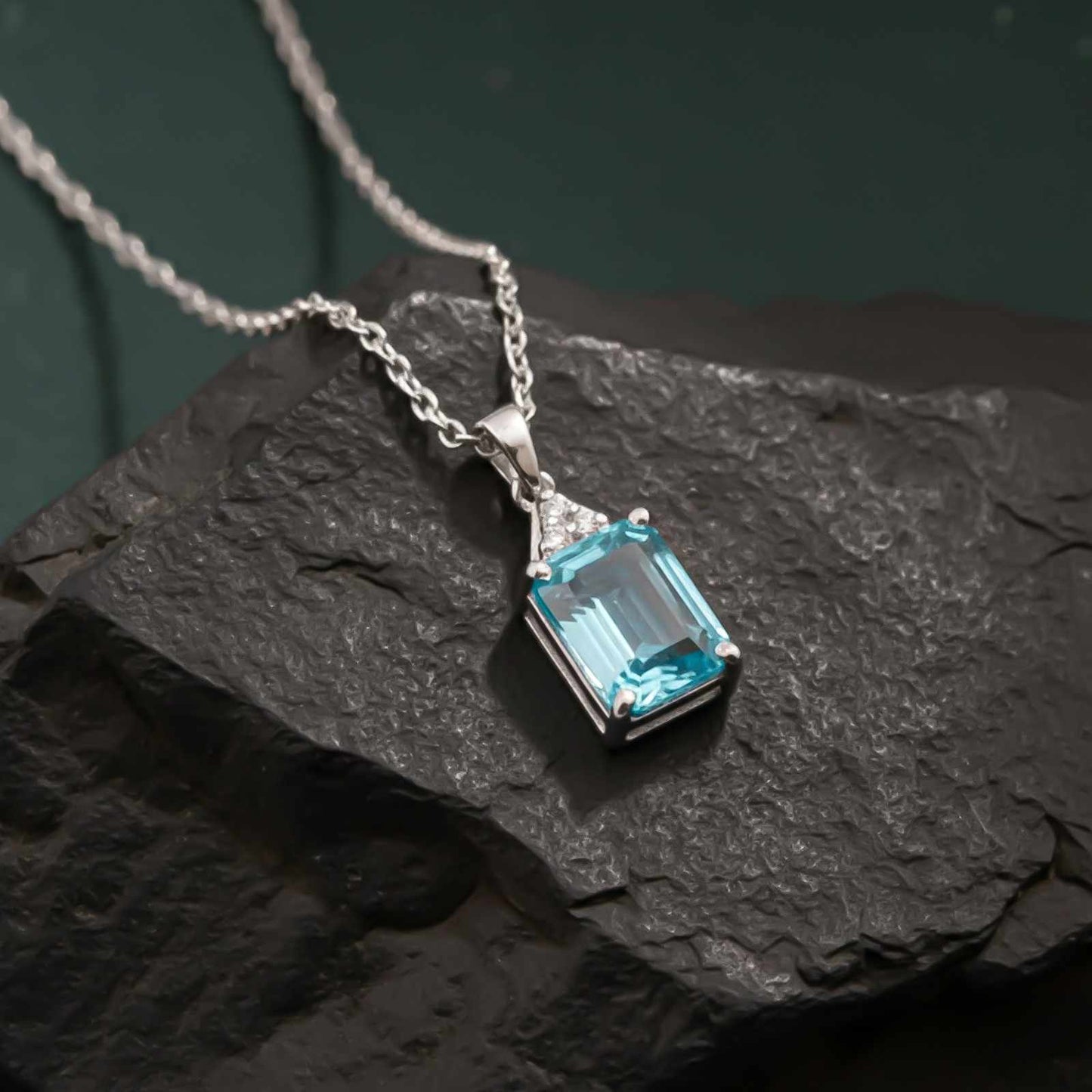 Silver Blue Topaz Emerald Cut Pendant
