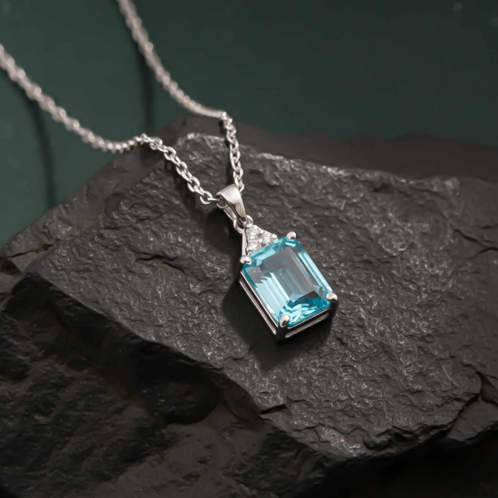 Silver Blue Topaz Emerald Cut Pendant
