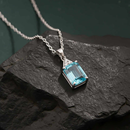 Silver Blue Topaz Emerald Cut Pendant