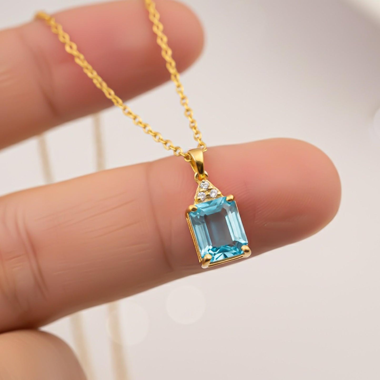 Silver Blue Topaz Emerald Cut Pendant