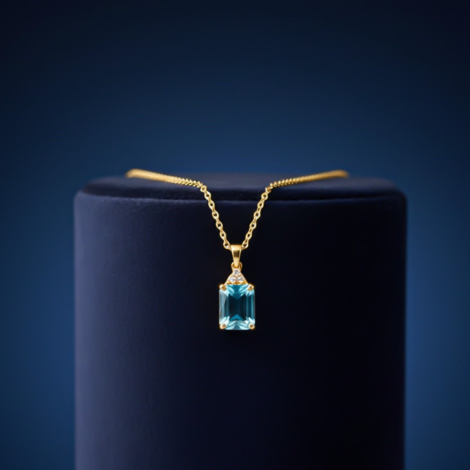 Silver Blue Topaz Emerald Cut Pendant